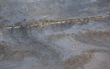 Reflections on a river with rapids on rocks