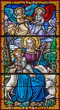 Cordoba - Madonna with the child among the sheps - windowpane