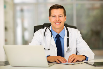 medical intern doctor sitting in office