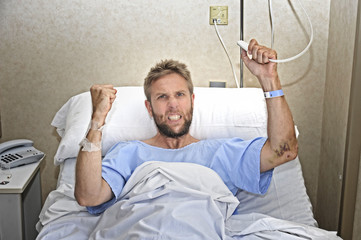 Obraz premium angry patient at hospital room in bed pressing nurse call button upset