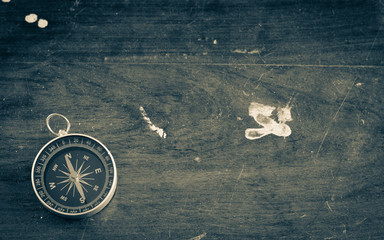 Vintage ancient wooden background with compass