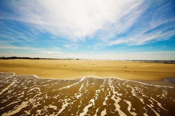 Ilha Comprida beach, São Paulo - Brazil. Waves in a sunny day at the end of brazilian island.