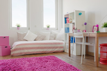 White room with pink carpet