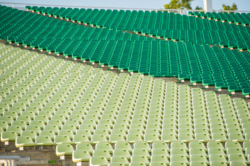 Rows of symmetrical seats in a stadium