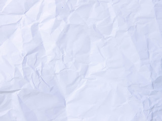 Crumpled paper texture pattern background in light pale blue col