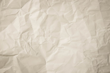 Crumpled paper texture pattern background in light white color t