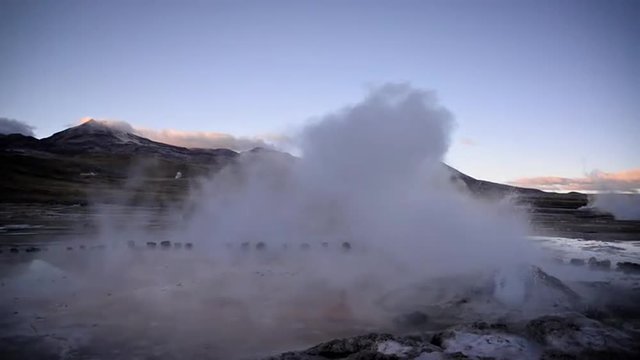 Steaming geyser in early morning in the El Tatio geyser field in Chile