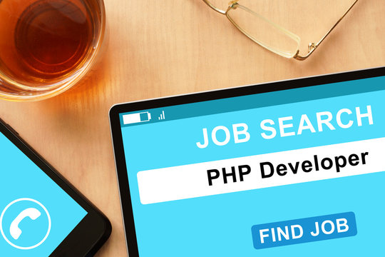 Tablet with PHP Developer  on job search site. - Powered by Adobe