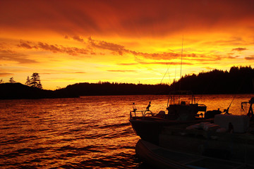 Fototapeta na wymiar Boat Silhouette at Sunset