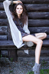 Outdoor fashion portrait of young beautiful woman.