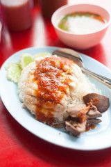 Chicken and rice thai food in soft light