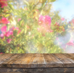 Naklejka na ściany i meble wood board table in front of summer landscape of flower bloom 