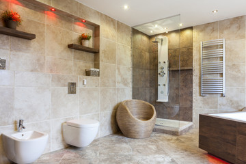 Luxury bathroom with beige tiles