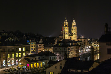 view of Zurich with Grossmunster church in evening, Switzerland