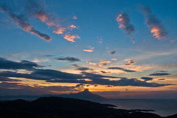 Greek coast of aegean sea at sunrise near holy mountain Athos