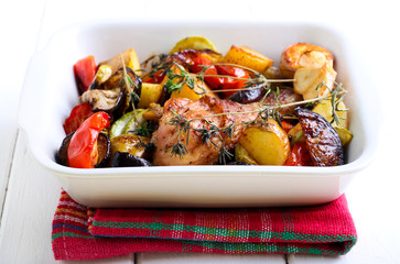 Baked vegetables and chicken drumstick