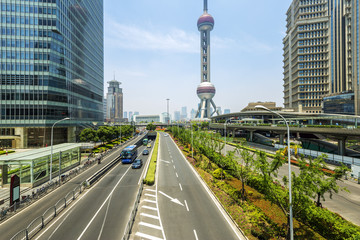Naklejka premium cityscape of shanghai and traffic on road