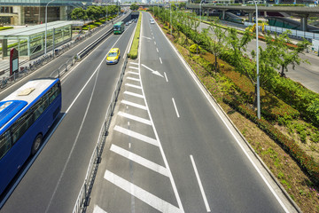 cityscape of shanghai and traffic on road