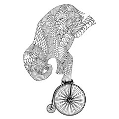 Stylized fantasy patterned elephant on vintage bicycle 