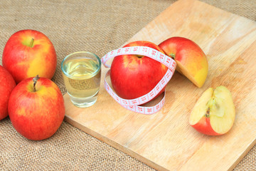 apple juice and measuring tape