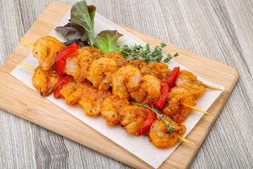 Raw tiger shrimps skewer