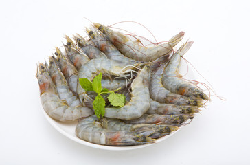 raw shrimps on white background
