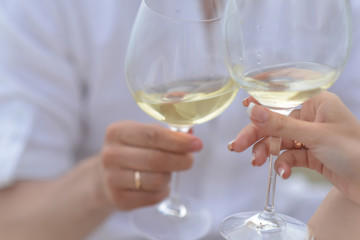 Man and woman with wine glasses