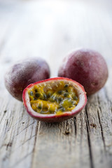fresh ripe passion fruit on a wooden background