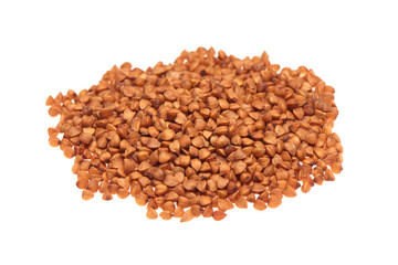 Pile of buckwheat seeds isolated on the white background