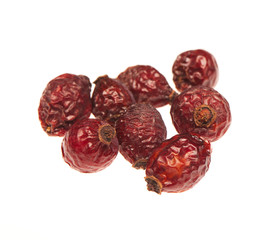 Dry berry rose hips isolated on a white background