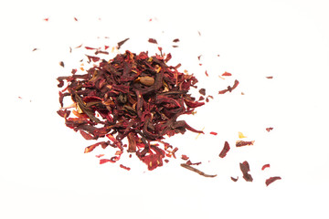 Heap of dry karkade tea leaves isolated on white background