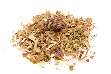 Heap of dry medical herbal tea isolated on white background