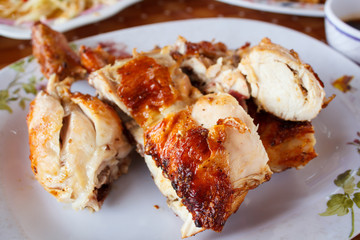 Grilled chicken on plate.