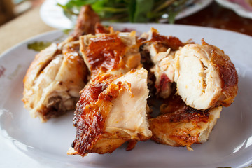 Grilled chicken on plate.