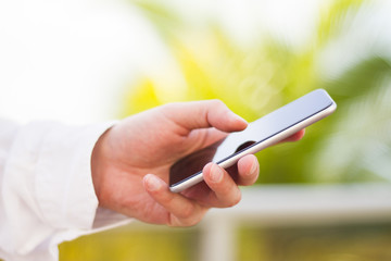 man with cell phone at nature
