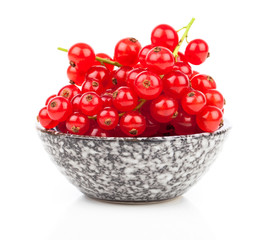 red currant in a bowl, on a white background.