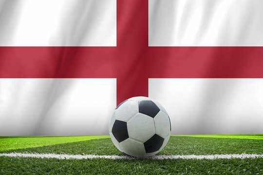 A soccer ball on England flag