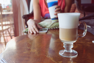 Fototapeta na wymiar coffee latte on wood table