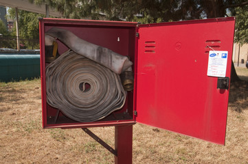 prevenzione incendi: contenitore  naspo,con lancia 