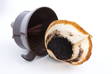 Black coffee and coffee filters, coffee with white background.