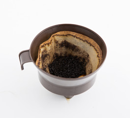 Black coffee and coffee filters, coffee with white background.