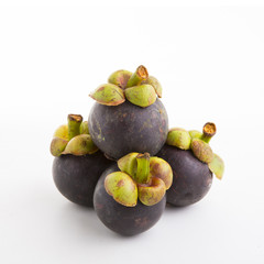 ripe mangosteen isolated on white background