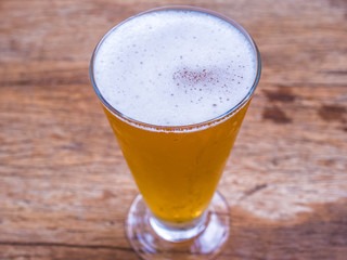 Closeup beer grass on wood background