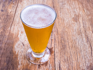Beer grass on wood background