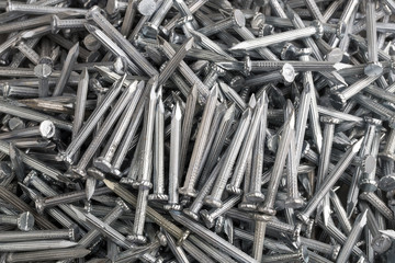 Heap of Silver Concrete nails on hand