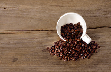 warm cup of coffee on wood background