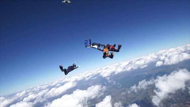 Skydiving formation teamwork. Recorded with DSLR camera 