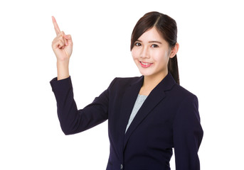 Asian young businesswoman with finger point up