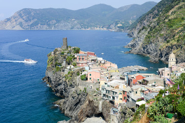 Scenic view of colorful village Vernazza and ocean coast