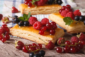 Homemade cakes with raspberries, currants, honey and mint 